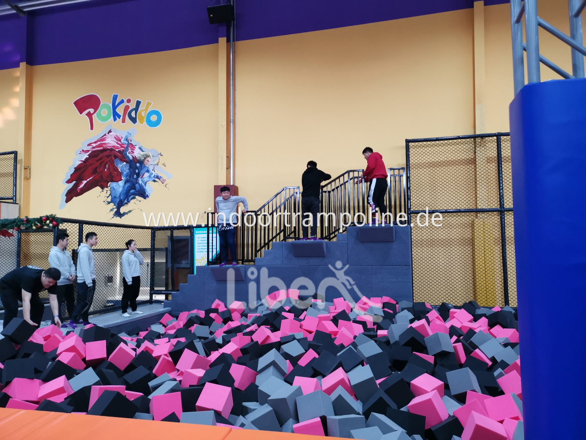 big trampoline with foam pit area